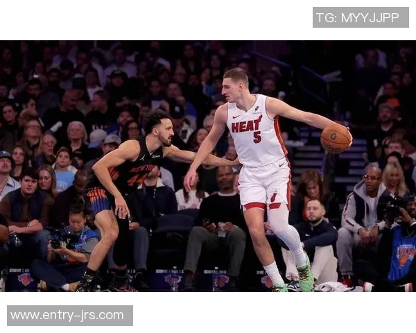 2014年热火与尼克斯激战回顾:篮球场上的经典对决与精彩瞬间 2014年热火与尼克斯激战回顾:篮球场上的经典对决与精彩瞬间